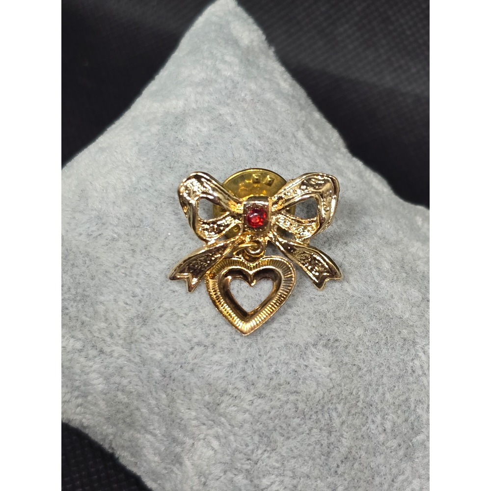 Vintage 90s Gold Tone Bow and Heart Dangle Lapel Pin Red Rhinestone Accent